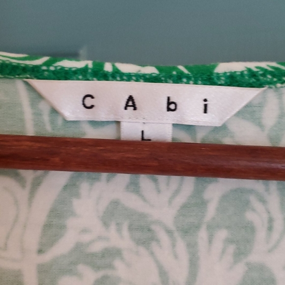 Green and white Cabi faux wrap dress. - Picture 2 of 5